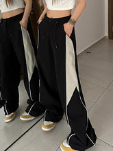 Pantalones deportivos de pierna recta en contraste